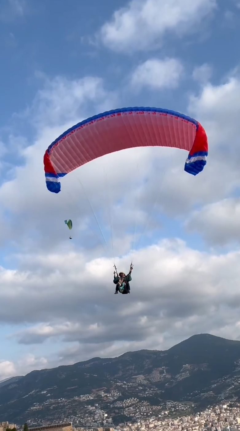 weFLY tandem paraglider in flight