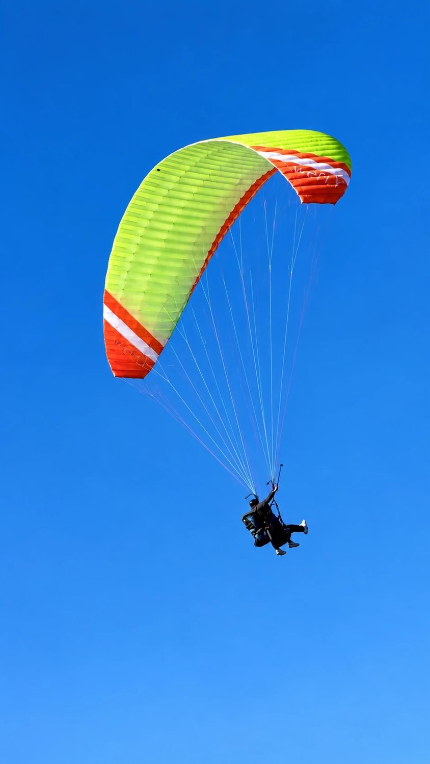 weFLY tandem paraglider in flight