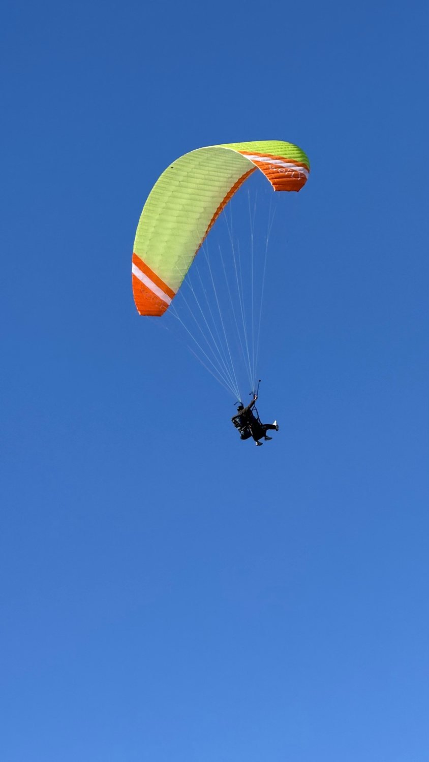 weFLY tandem paraglider in flight